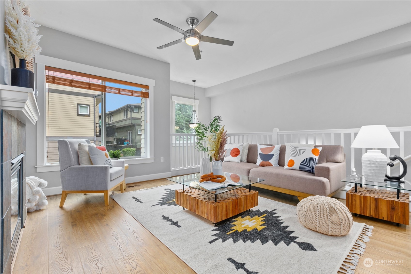 2115 201st Place Southeast, Unit D3 Bothell, WA 98012 - Photo 6 of 25 a living room with furniture and a large window