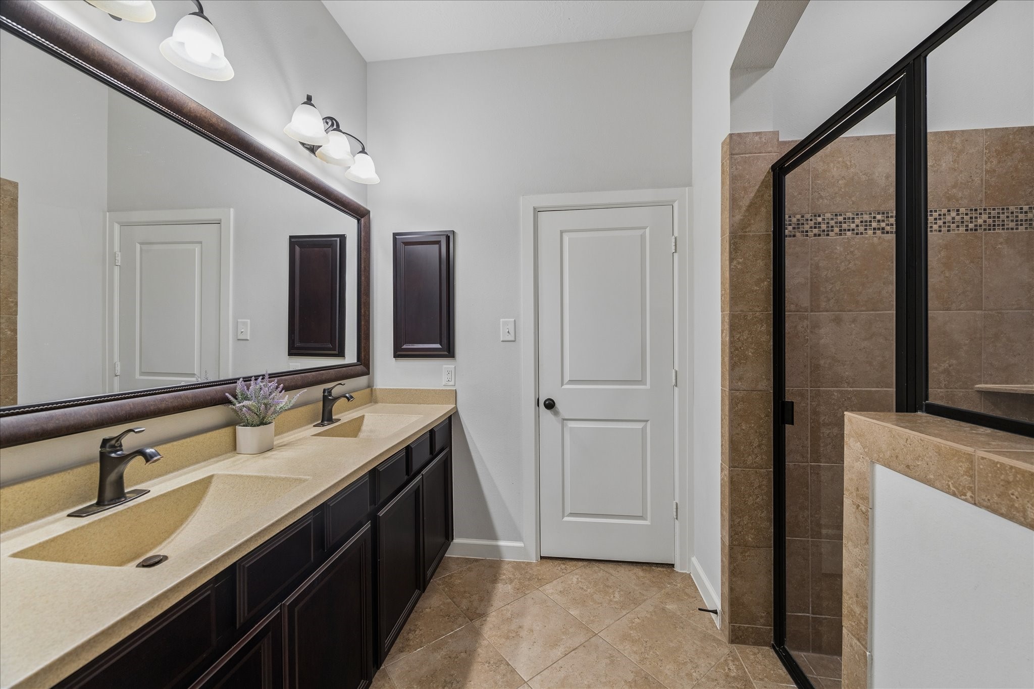 31618 Ember Trail Lane Spring, TX 77386 - Photo 19 of 44 Primary ensuite bathroom w/ walk in shower- 1st floor