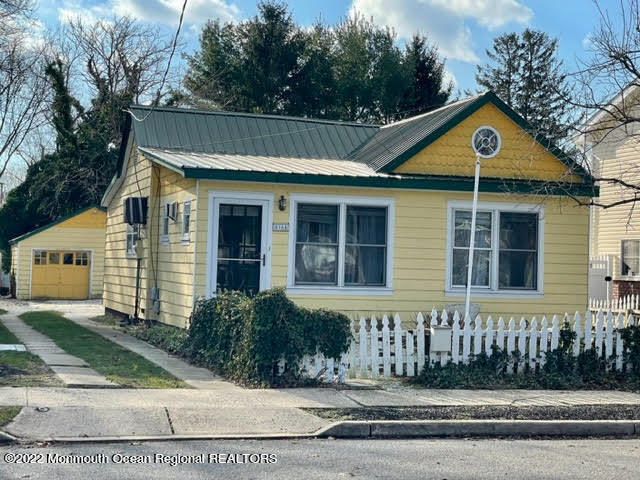 816 Atlantic Avenue, Unit A Point Pleasant, NJ 08742 - Photo 1 of 23 a front view of a house with a yard