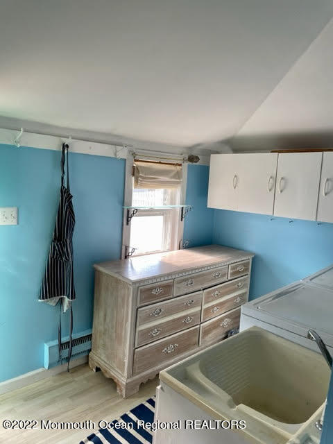 816 Atlantic Avenue, Unit A Point Pleasant, NJ 08742 - Photo 23 of 23 a room with storage and utility