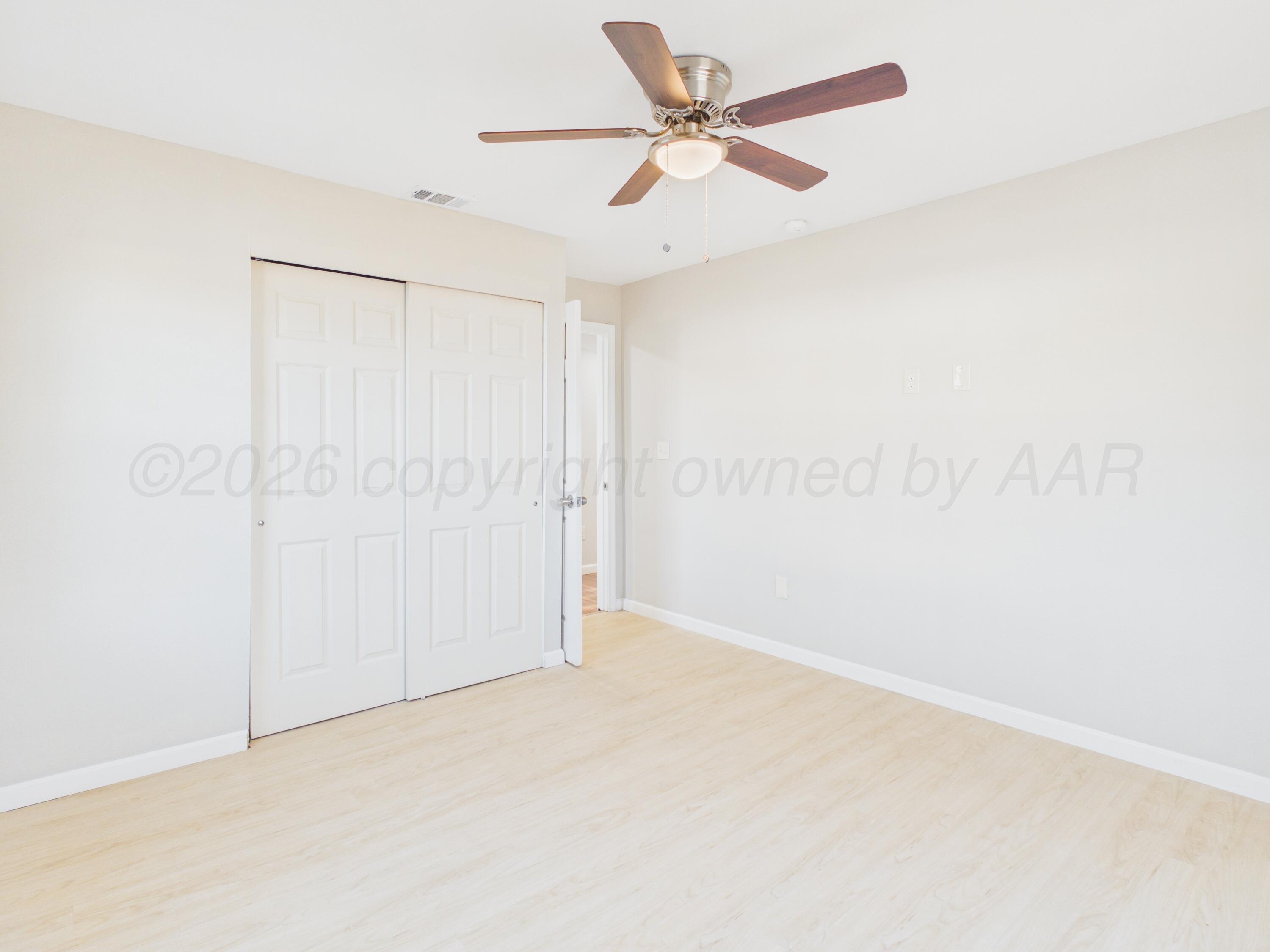 310 North Virginia Street Amarillo, TX 79106 - Photo 19 of 33 an empty room with a fan & a window