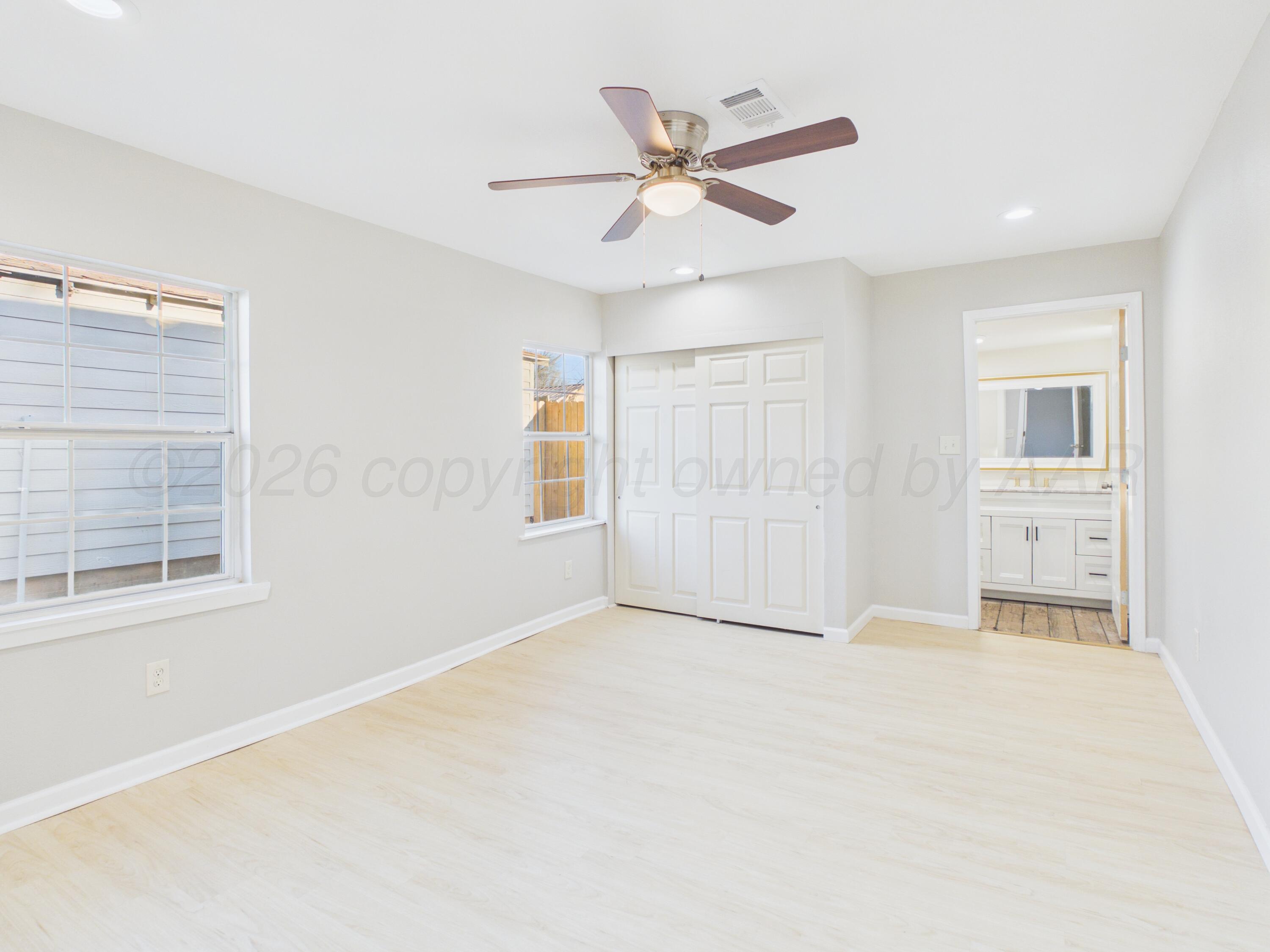 310 North Virginia Street Amarillo, TX 79106 - Photo 21 of 33 a view of an empty room with a window