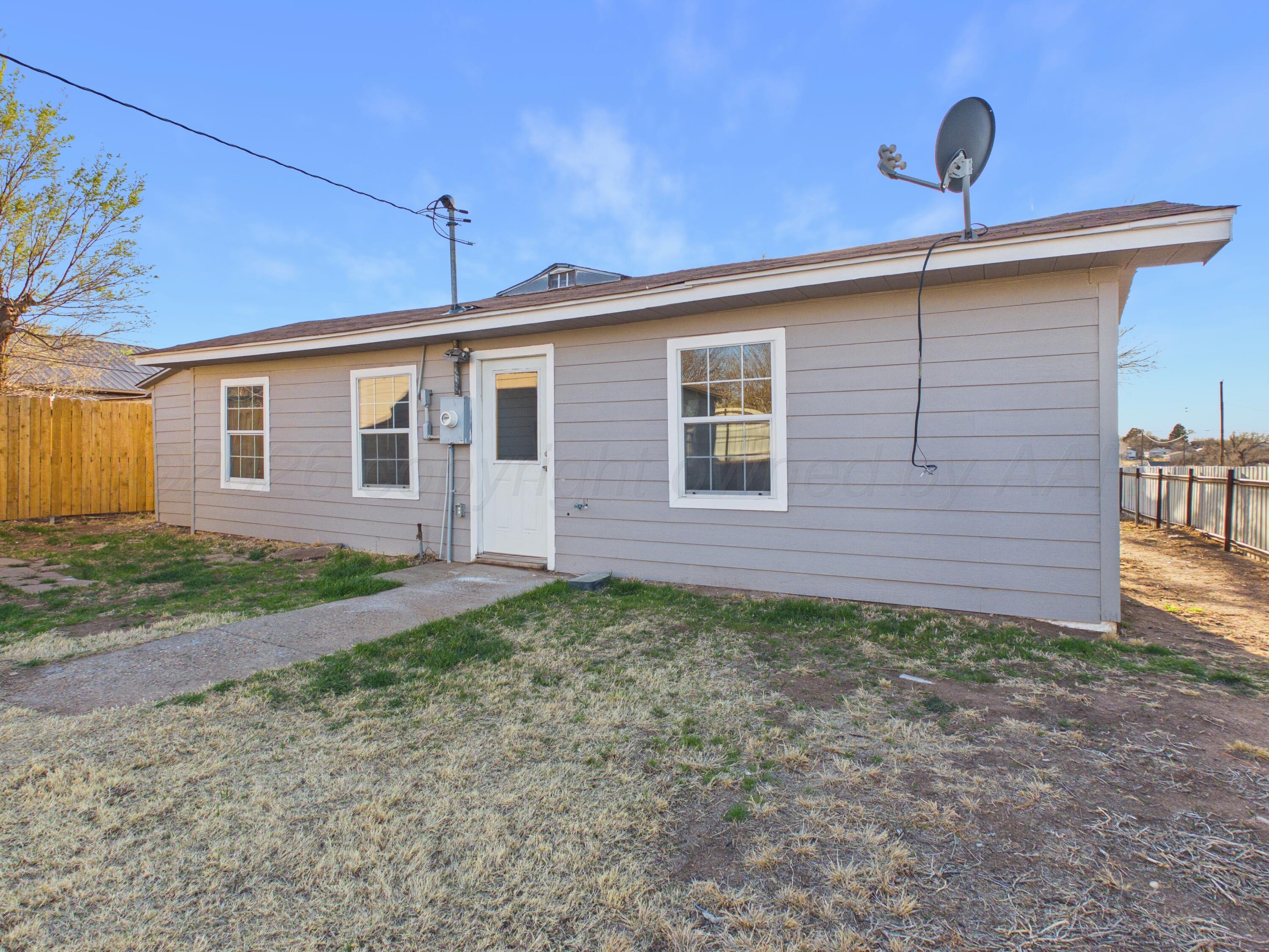 310 North Virginia Street Amarillo, TX 79106 - Photo 26 of 33 a view of a backyard of a house