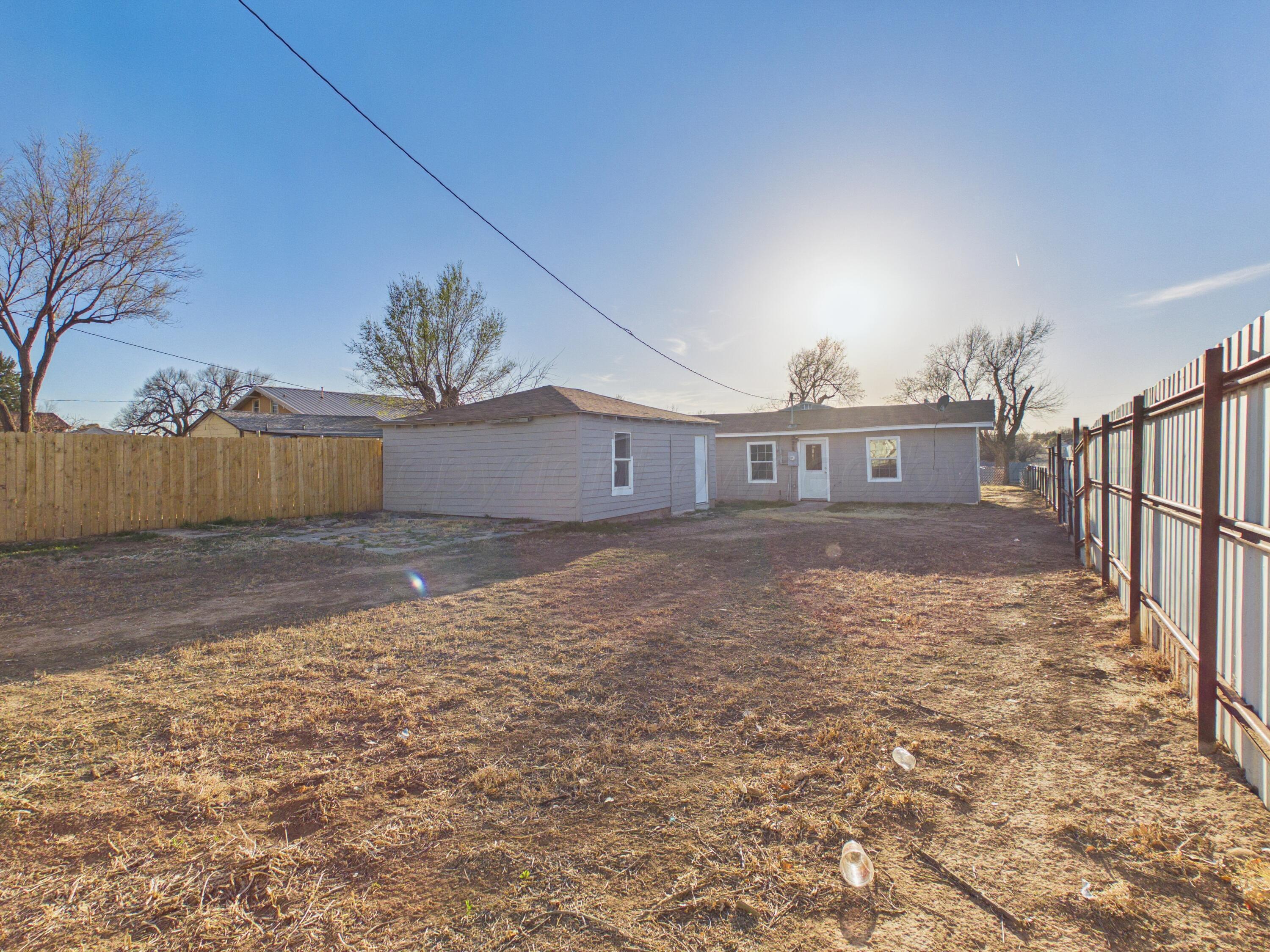 310 North Virginia Street Amarillo, TX 79106 - Photo 27 of 33 a view of a house with a yard