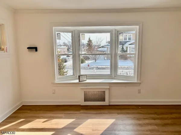 a view of a room that has a window in it