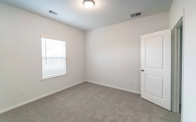 an empty room with a window