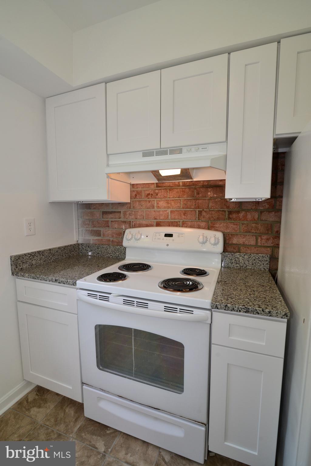 5841 Royal Ridge Drive, Unit 947 Springfield, VA 22152 - Photo 2 of 22 Kitchen featuring soft closed cabinets