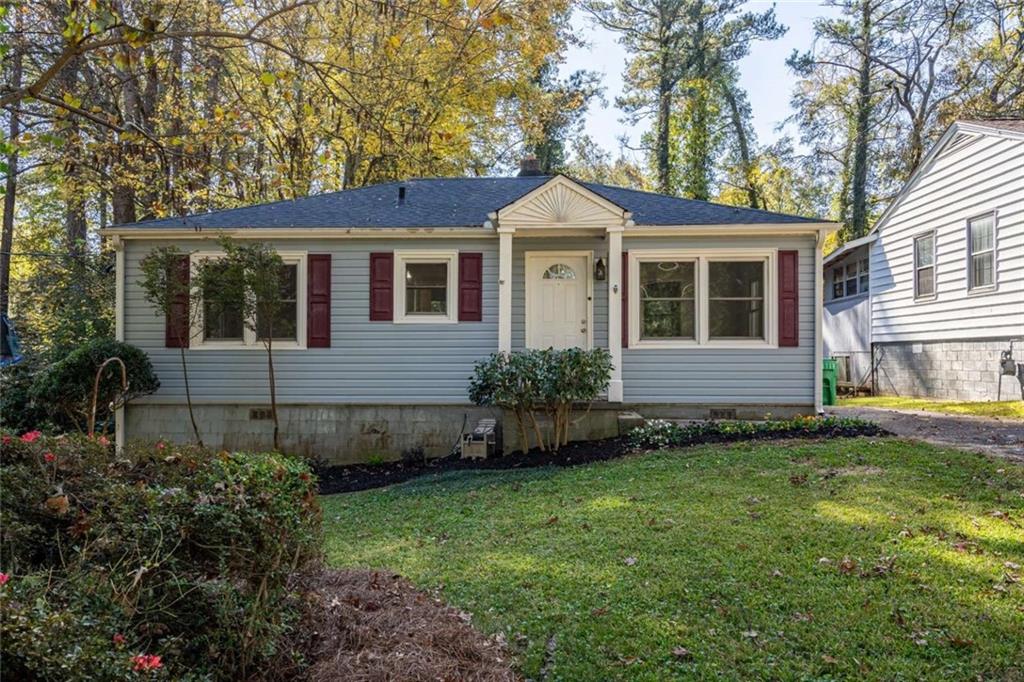 3427 Bennington Drive Decatur, GA 30032 - Photo 1 of 1 a front view of a house with a yard