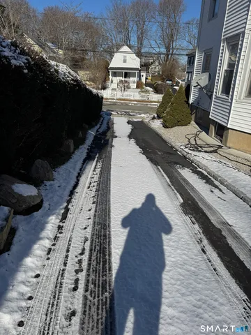 a view of a back yard of the house