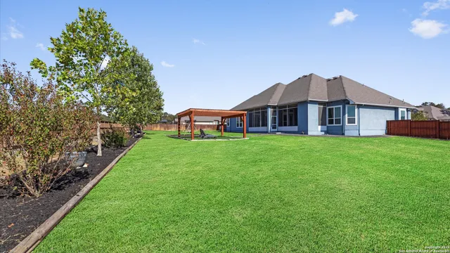 a view of outdoor space with swimming pool and lake view
