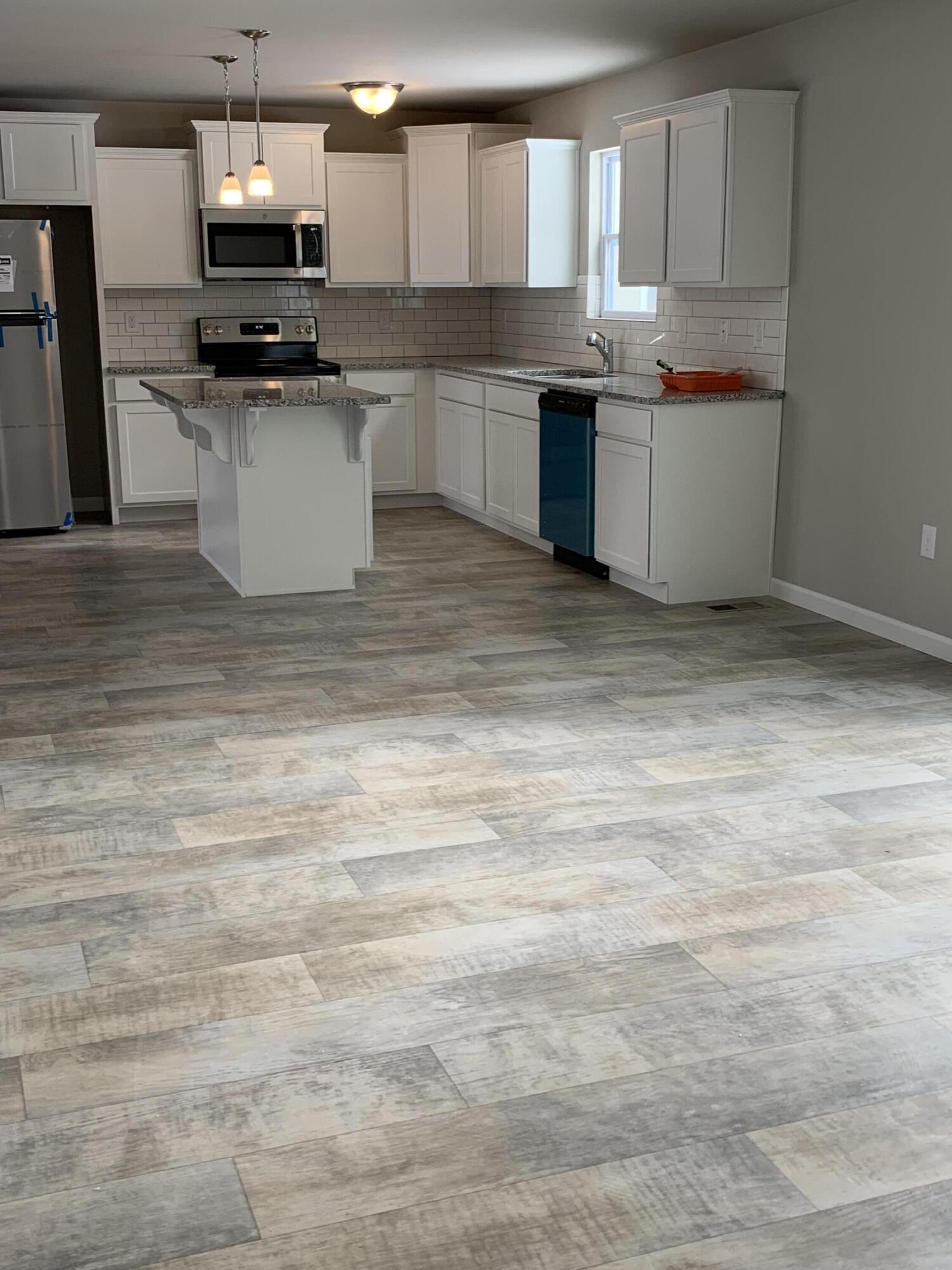 1453 Weatherstone Lane Howell, MI 48843 - Photo 3 of 16 IMG_1233