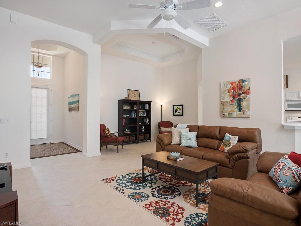 16192 Parque Lane Naples, FL 34110 - Photo 2 of 27 Living Room and Foyer