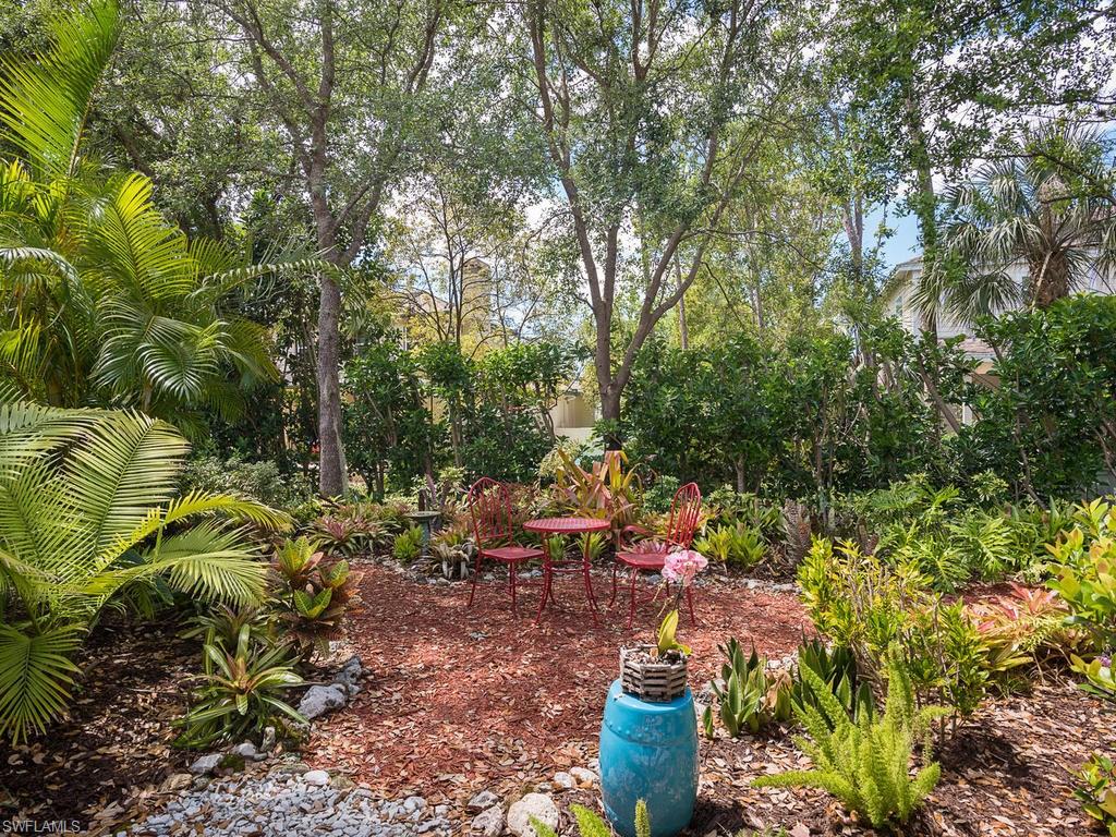 16192 Parque Lane Naples, FL 34110 - Photo 13 of 27 Tropical Landscaped Garden