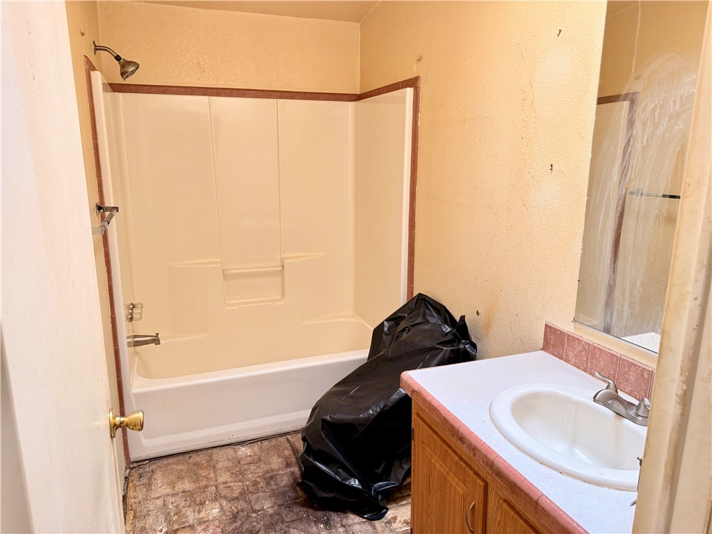 5495 Destiny Way Golden Valley, AZ 86413 - Photo 20 of 48 a bathroom with a sink and a mirror