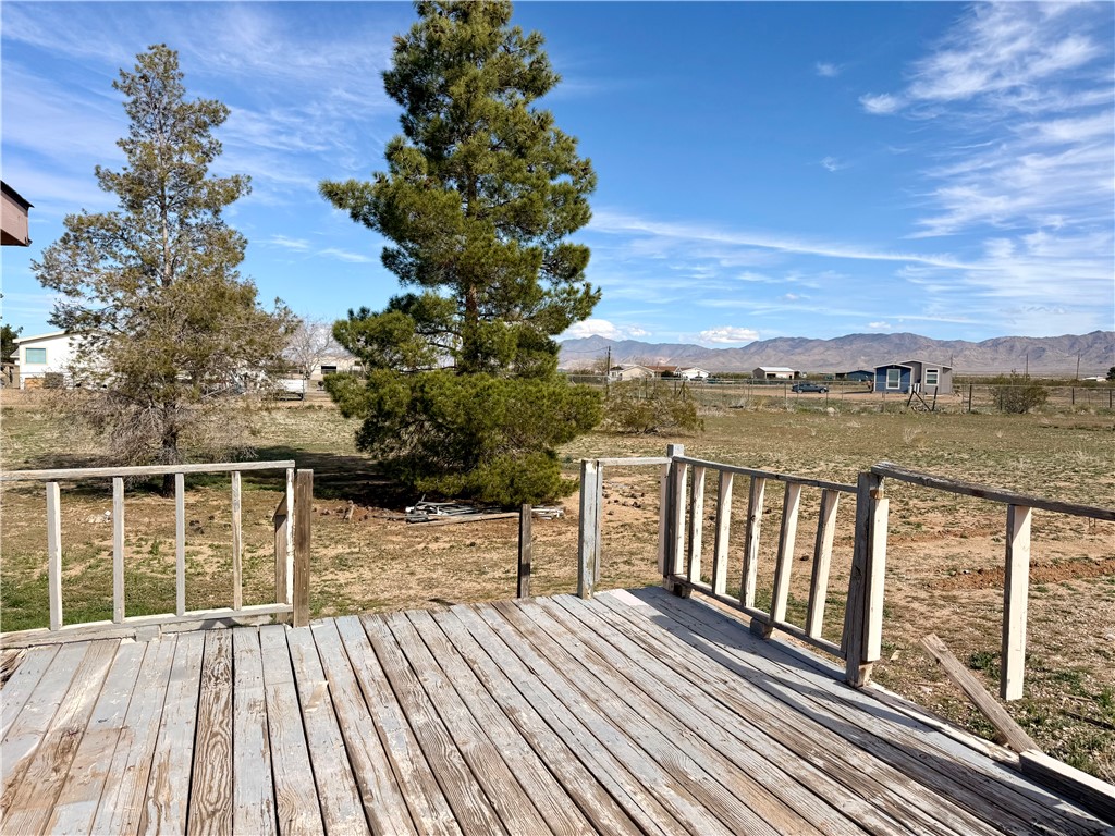 5495 Destiny Way Golden Valley, AZ 86413 - Photo 26 of 48 a view of balcony with wooden floor and fence
