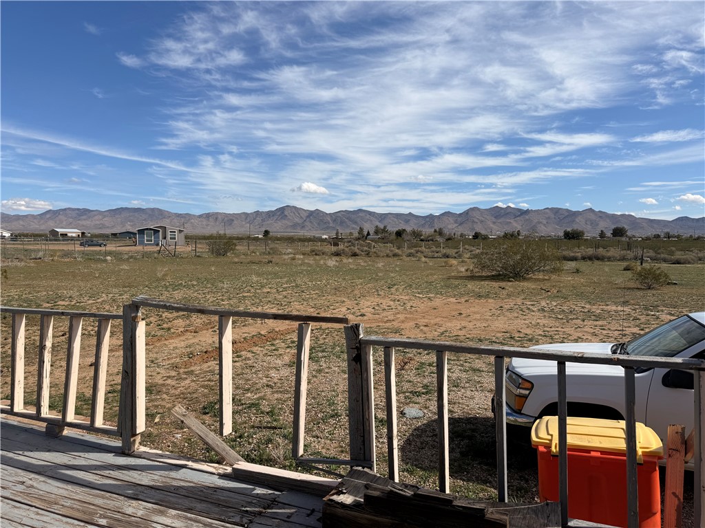5495 Destiny Way Golden Valley, AZ 86413 - Photo 27 of 48 a view of a lake with a mountain view