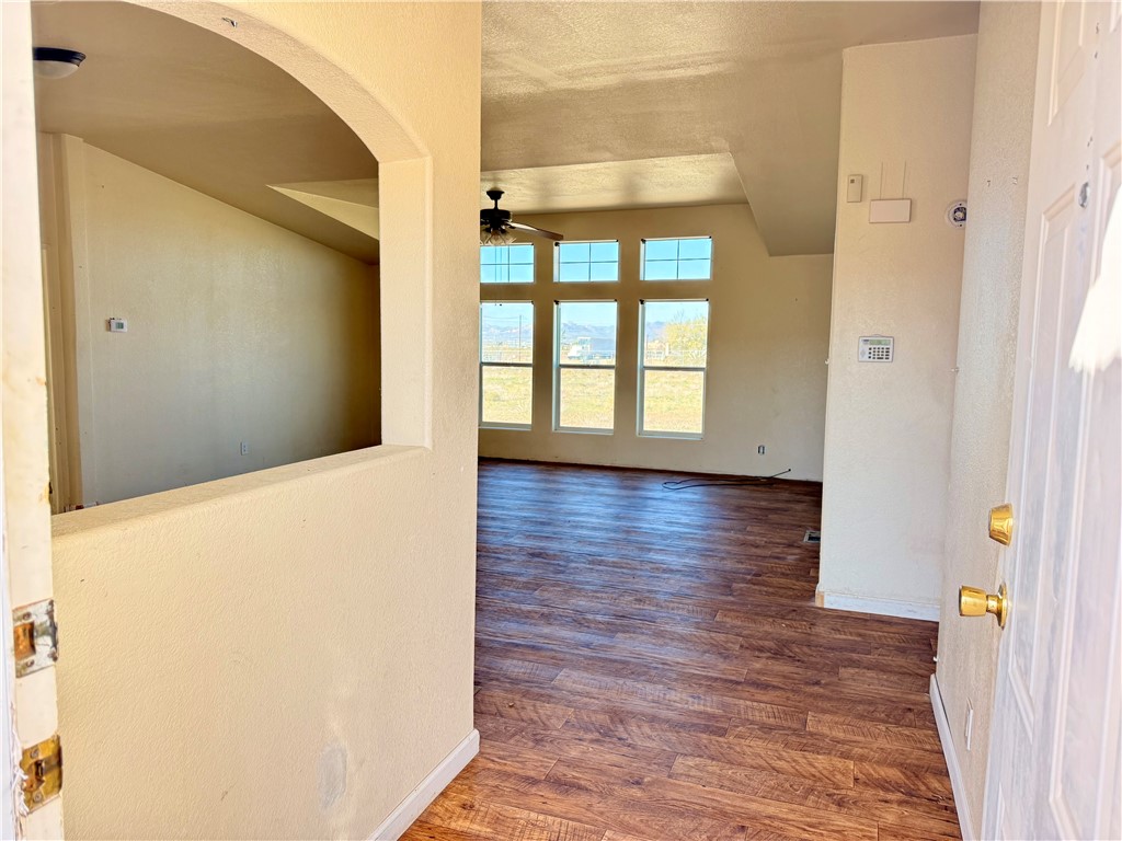 5495 Destiny Way Golden Valley, AZ 86413 - Photo 3 of 48 a view of a hallway with wooden floor
