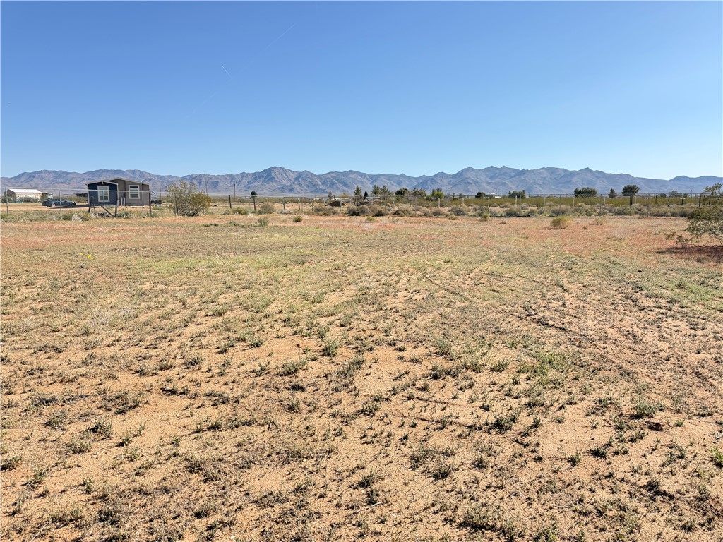 5495 Destiny Way Golden Valley, AZ 86413 - Photo 33 of 48 a view of a lake with houses in the back