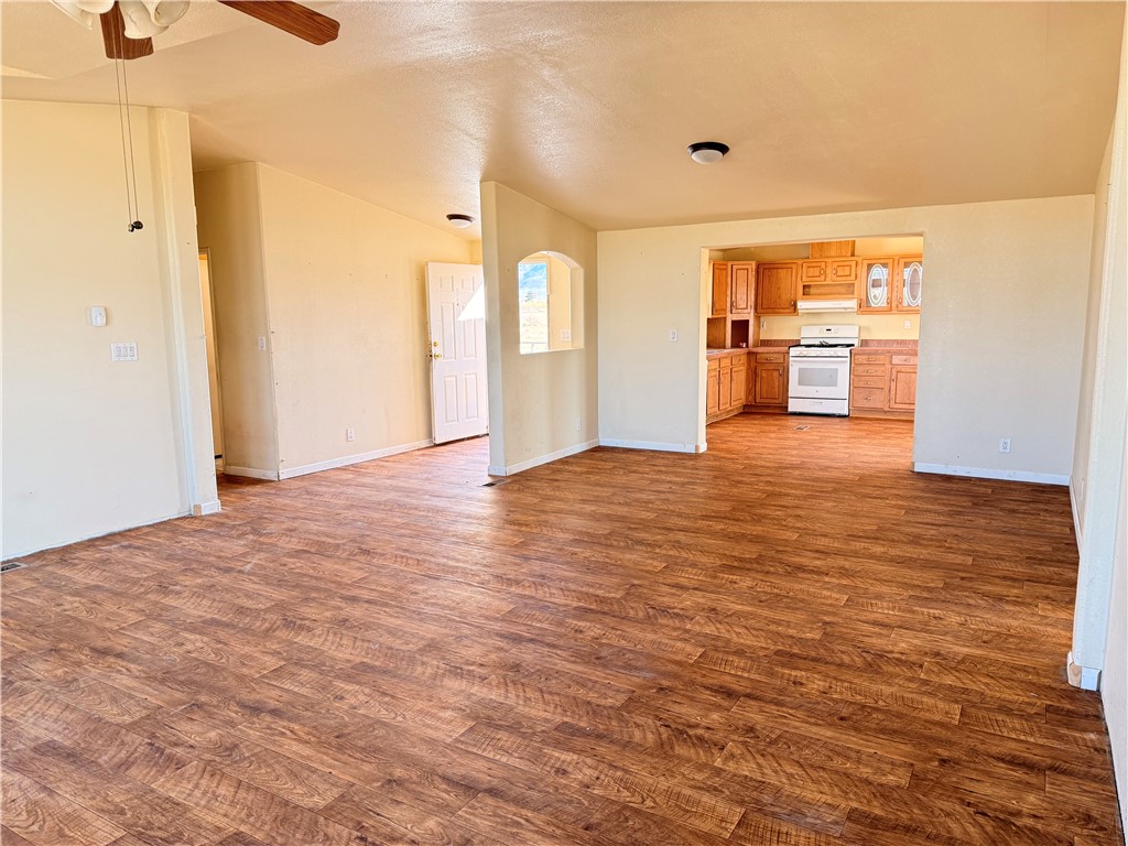 5495 Destiny Way Golden Valley, AZ 86413 - Photo 8 of 48 a view of a livingroom with wooden floor