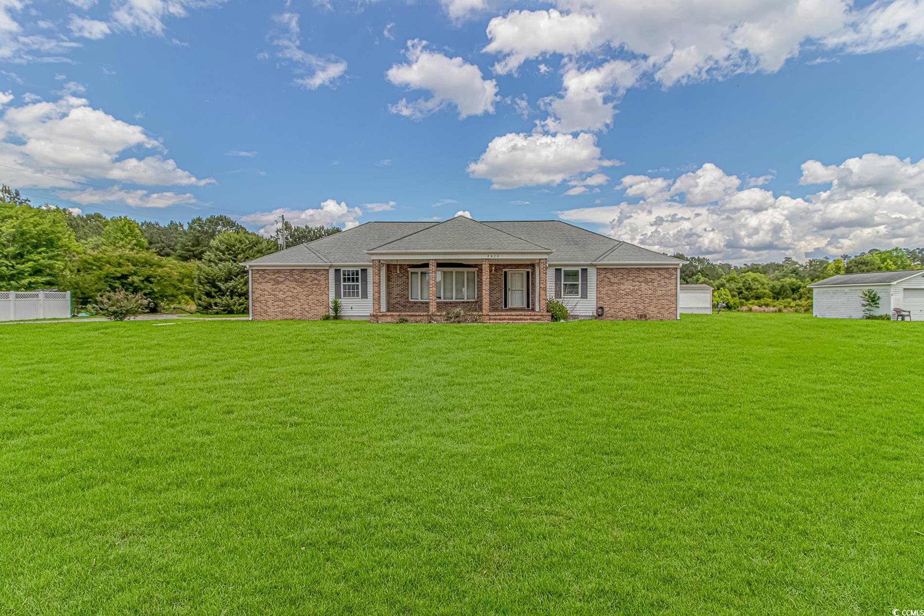 2829 Highway 129 Galivants Ferry, SC 29544 - Photo 1 of 40 View of front of house with brick siding and covered porch