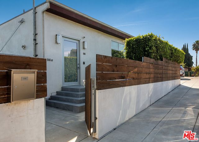 a view of a house with a garage