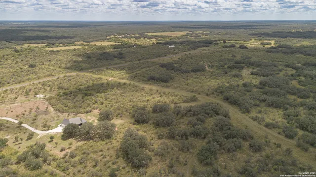 a house with a yard and a fountain