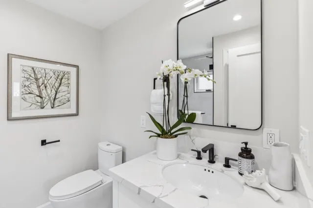 a spacious bedroom with a bed and window