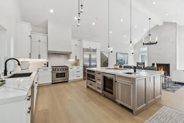 a bathroom with a double vanity sink and mirror