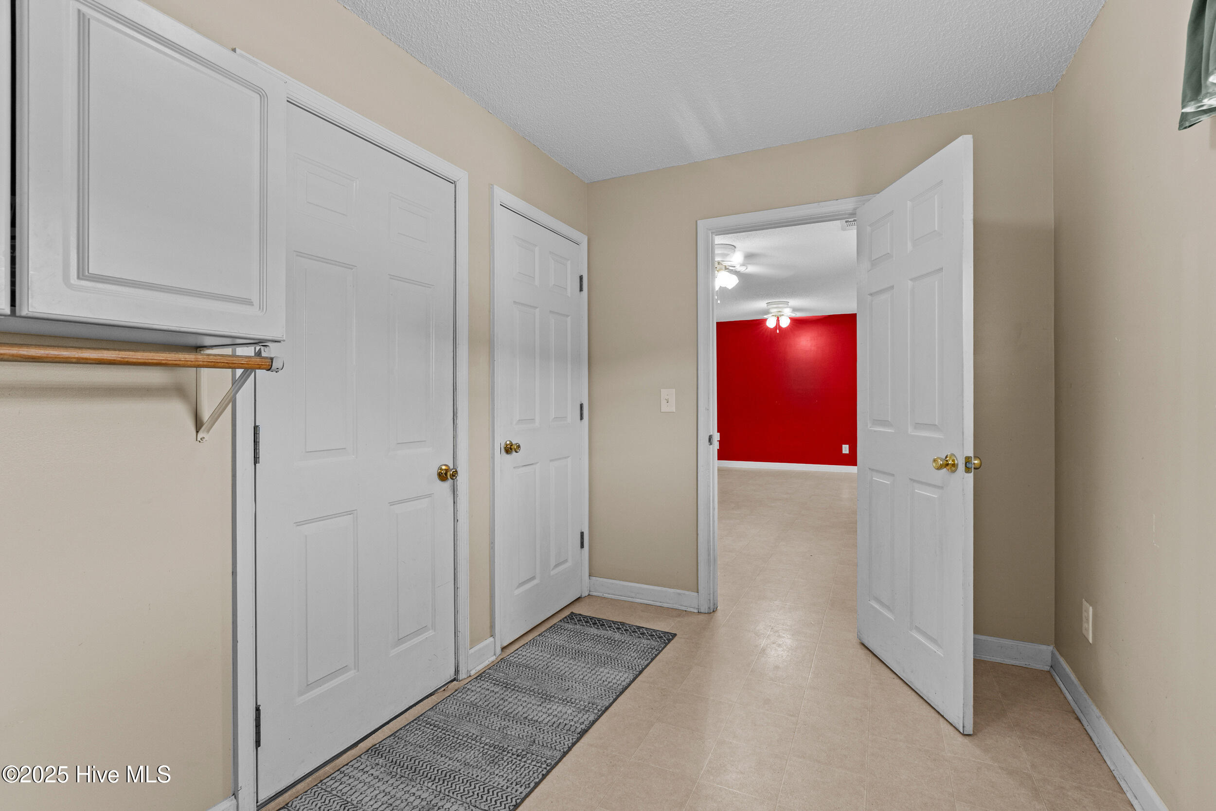 144 Brock Ridge Elizabeth City, NC 27909 - Photo 12 of 51 Red wall in kitchen has been repainted a neutral color