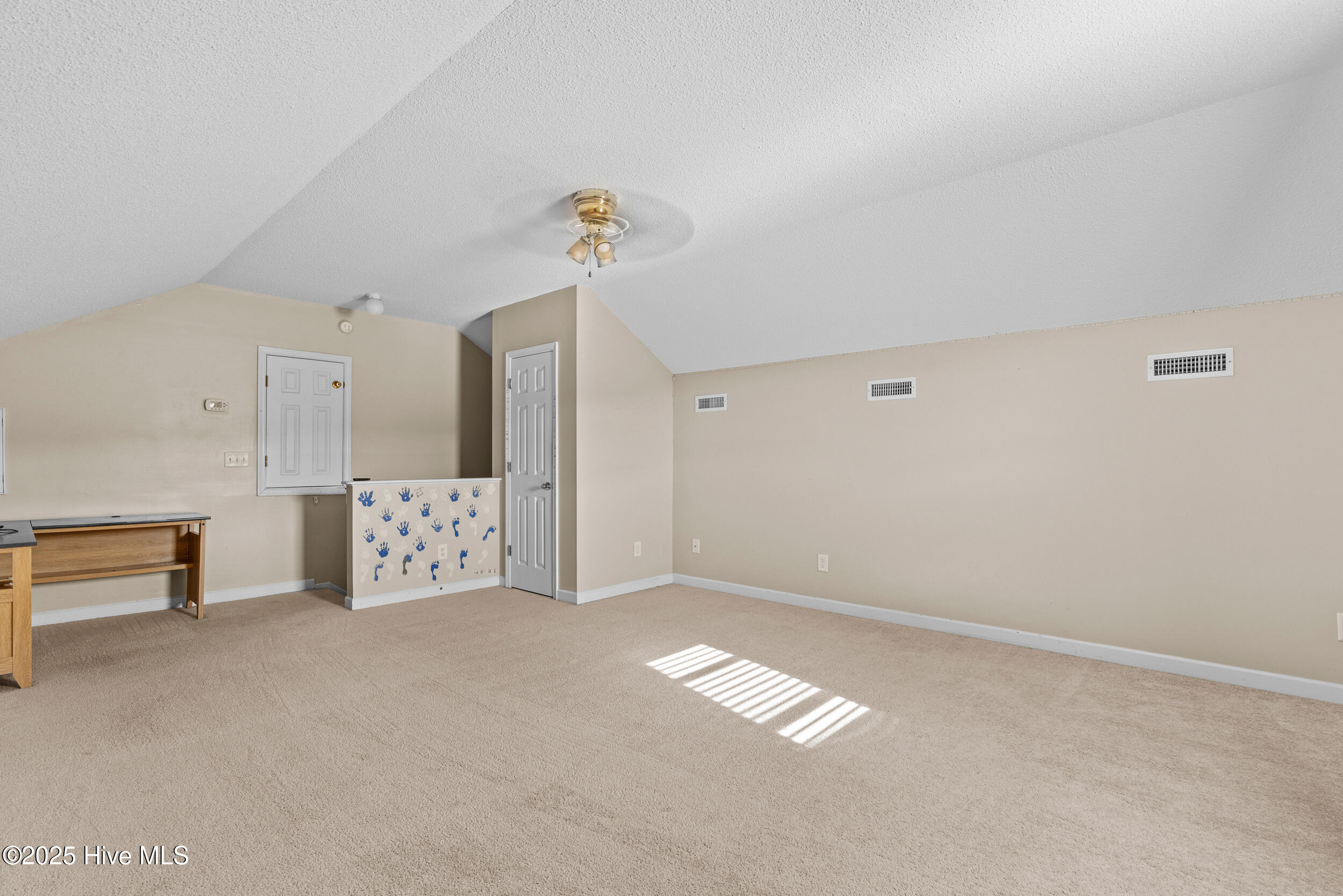 144 Brock Ridge Elizabeth City, NC 27909 - Photo 14 of 51 Small half wall has been repainted a neutral color.