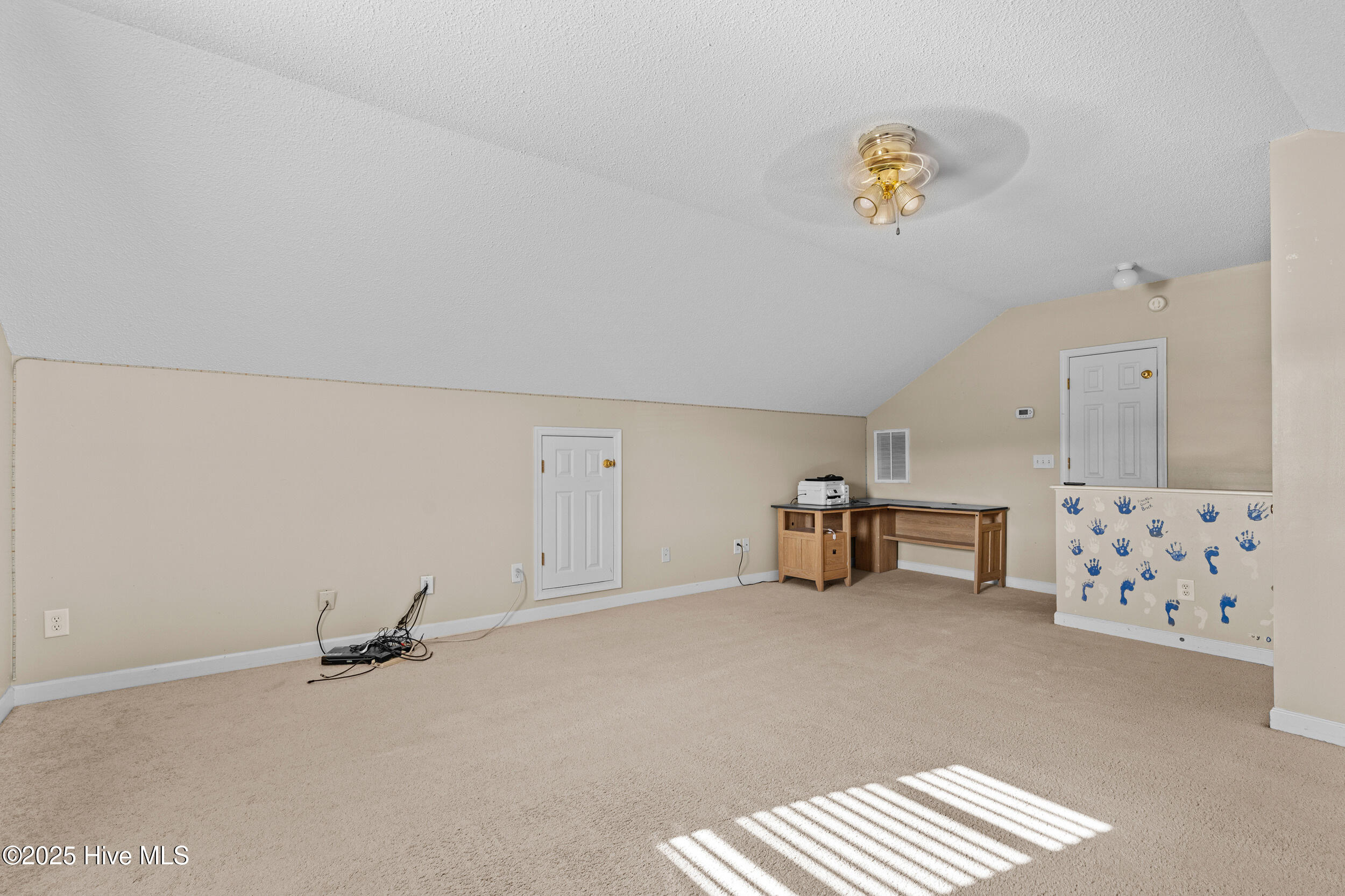 144 Brock Ridge Elizabeth City, NC 27909 - Photo 15 of 51 Small half wall has been repainted a neutral color.