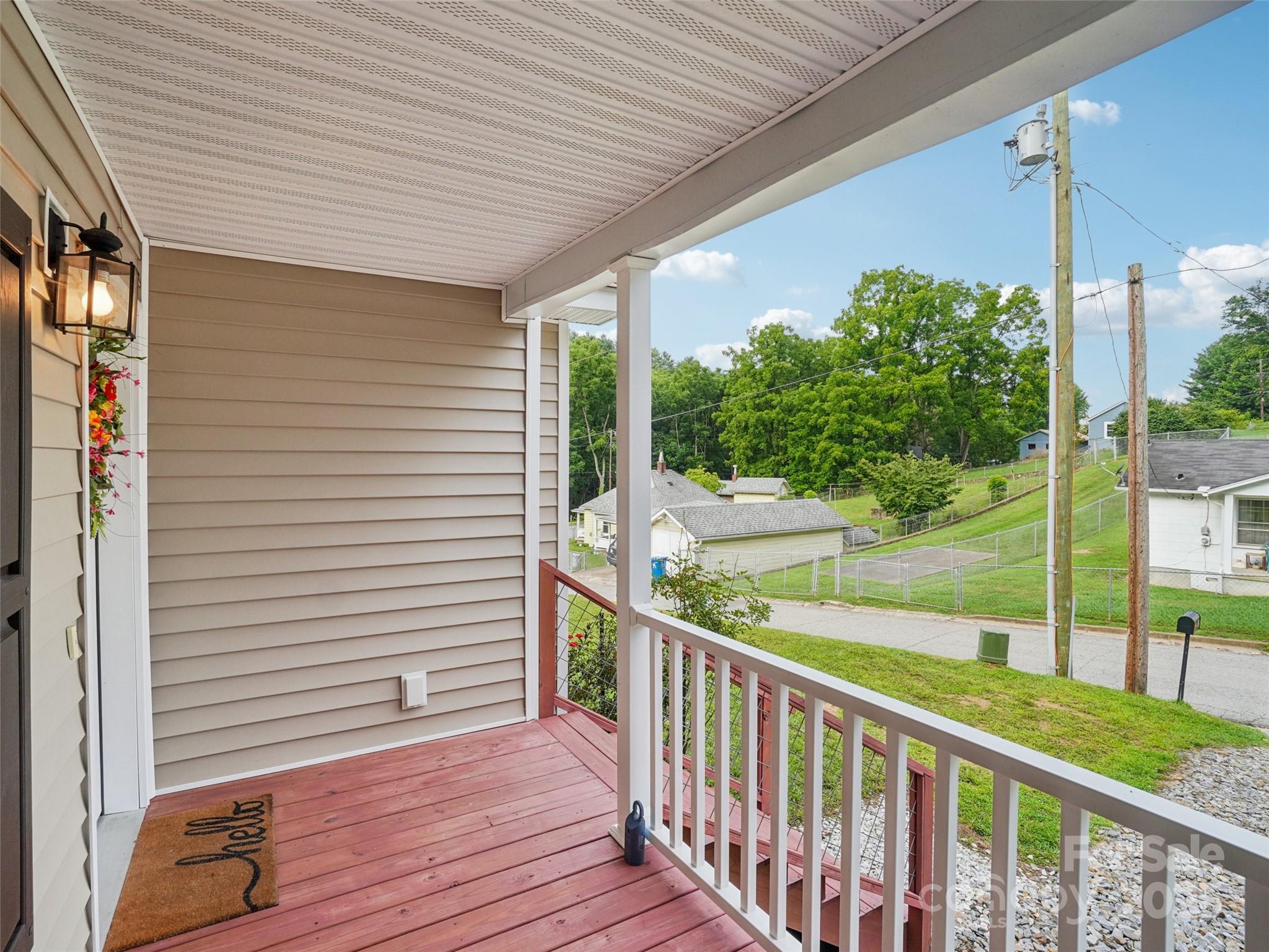 32 Lewis Street Canton, NC 28716 - Photo 19 of 27 a view of a porch with wooden floor