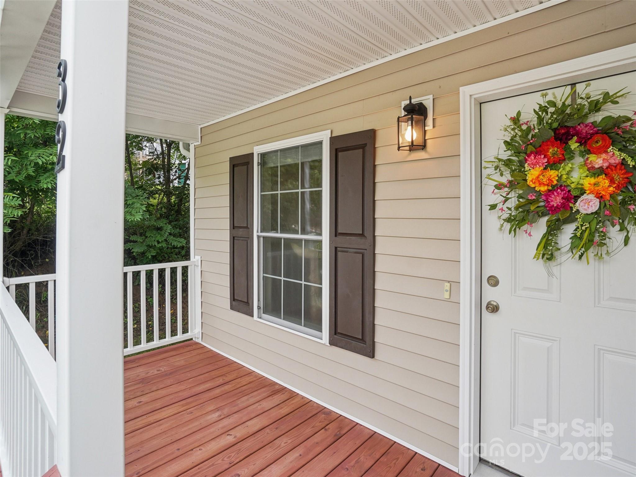 32 Lewis Street Canton, NC 28716 - Photo 27 of 27 a view of entryway with wooden floor and front door