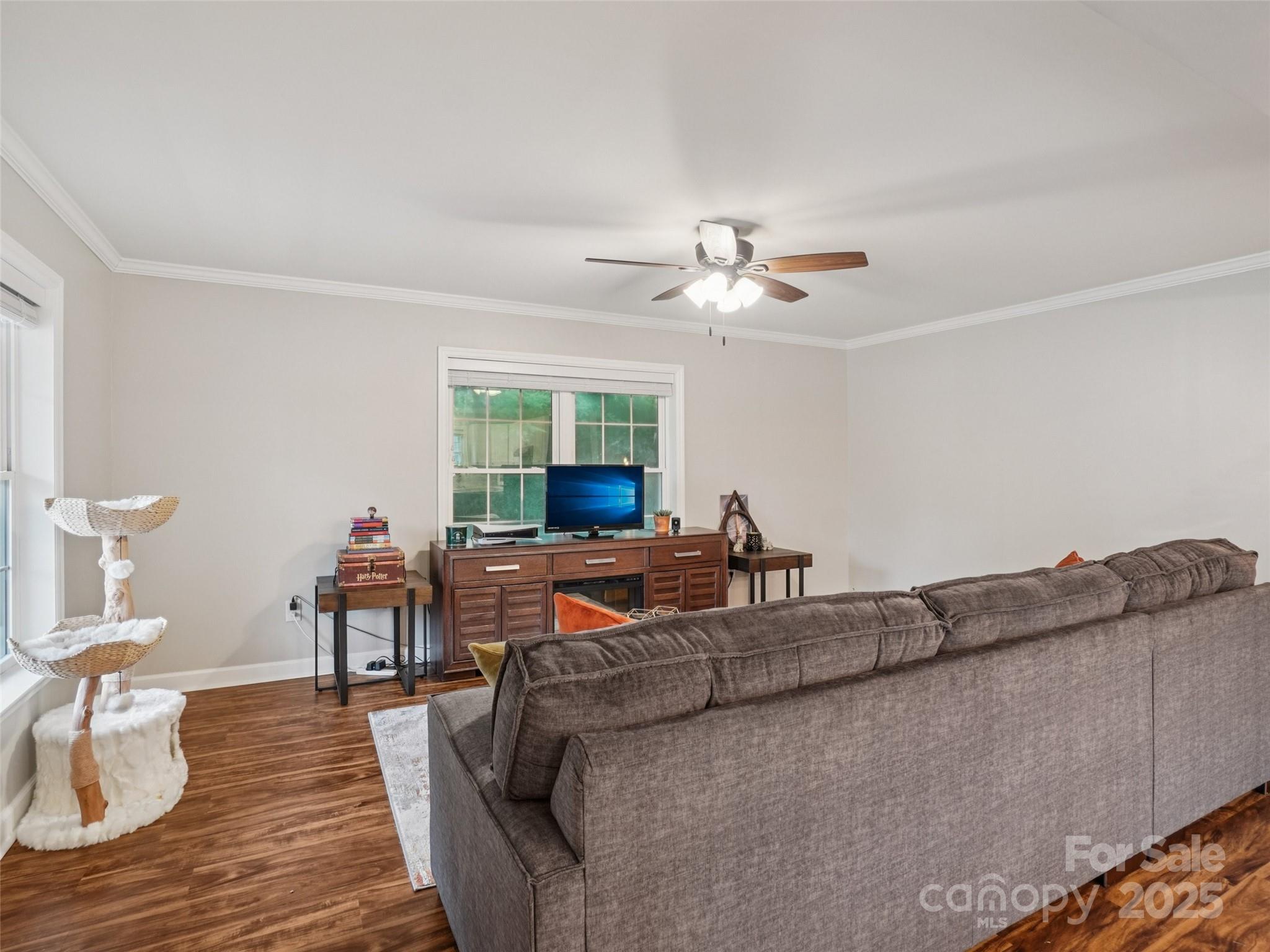 32 Lewis Street Canton, NC 28716 - Photo 7 of 27 a living room with furniture and a wooden floor