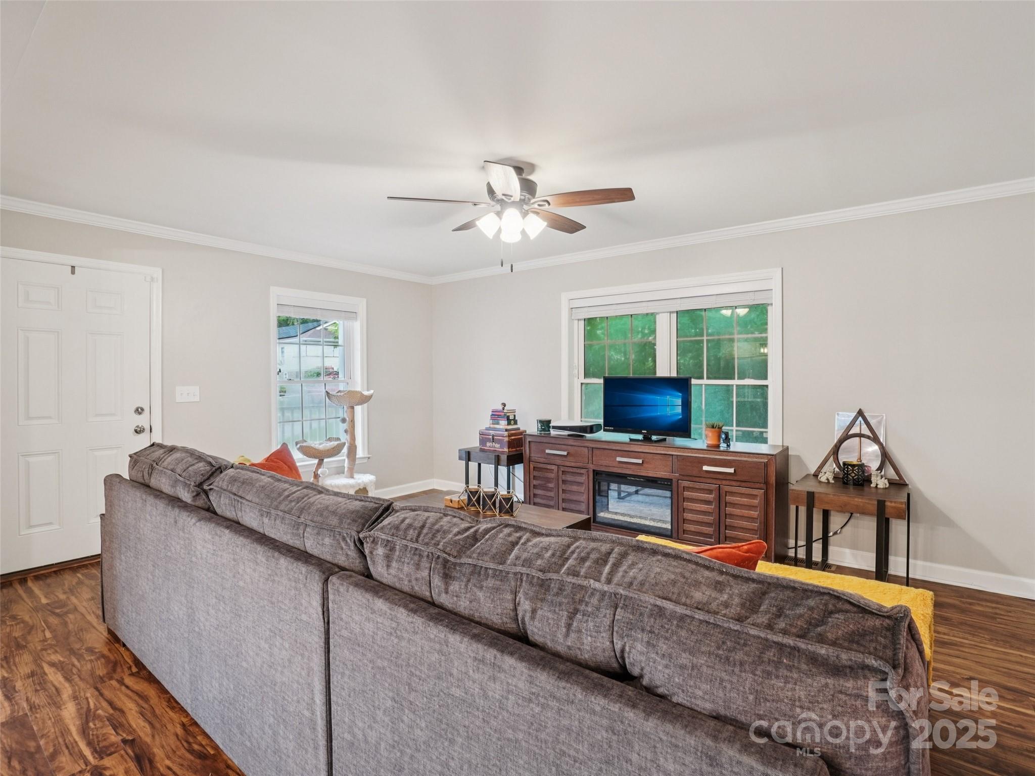 32 Lewis Street Canton, NC 28716 - Photo 9 of 27 a living room with furniture and a wooden floor