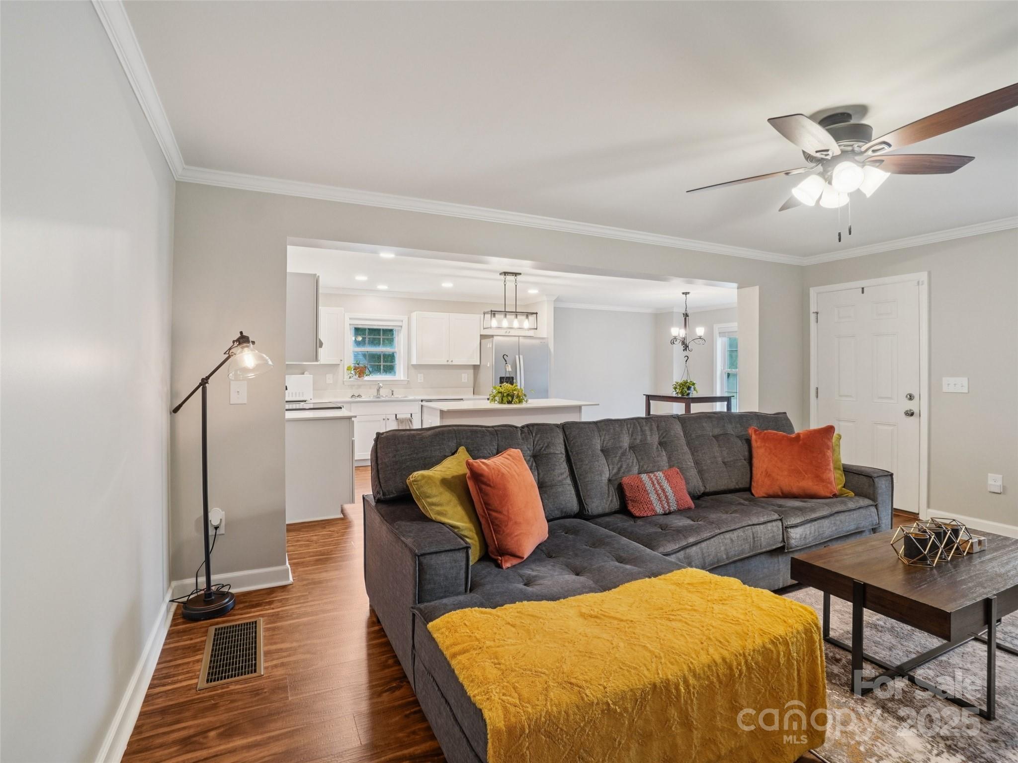 32 Lewis Street Canton, NC 28716 - Photo 10 of 27 a living room with furniture and kitchen view