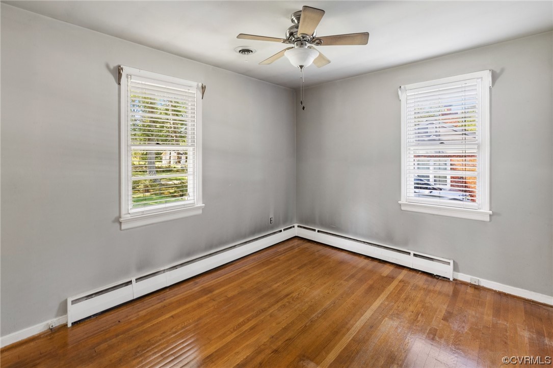 9303 Edson Road Henrico, VA 23229 - Photo 16 of 20 a view of an empty room with a window and wooden floor
