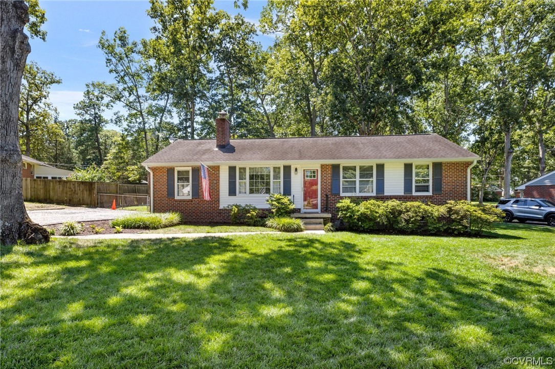 9303 Edson Road Henrico, VA 23229 - Photo 2 of 20 a front view of a house with a yard and porch