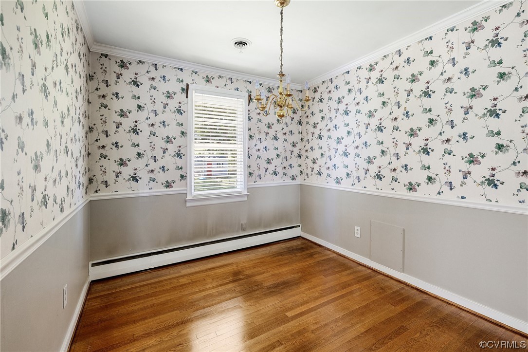 9303 Edson Road Henrico, VA 23229 - Photo 7 of 20 a view of a room with wooden floor and a window