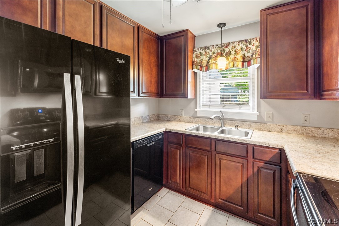 9303 Edson Road Henrico, VA 23229 - Photo 9 of 20 a kitchen with stainless steel appliances granite countertop a refrigerator and a sink