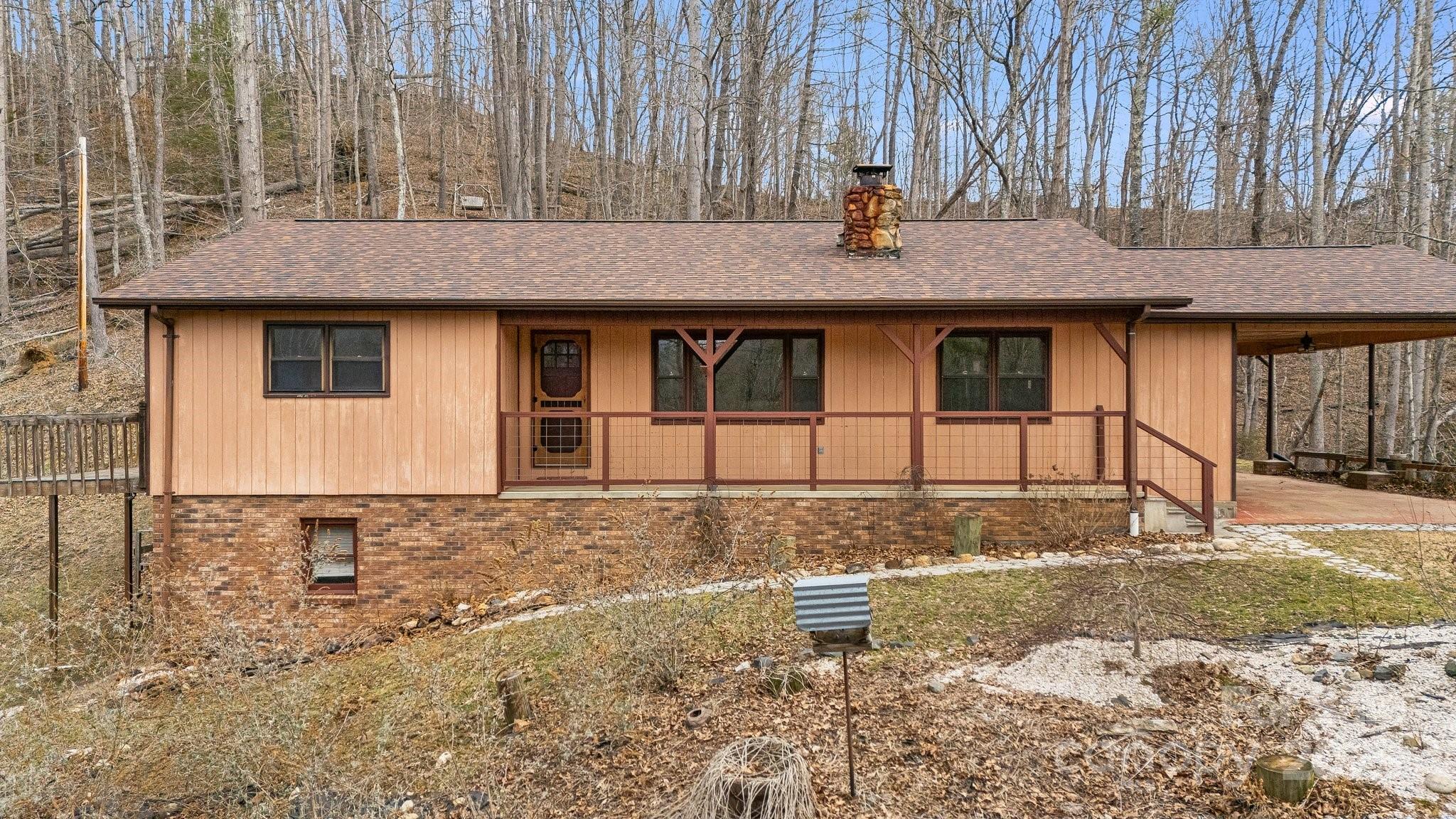 1185 Roses Branch Road Green Mountain, NC 28740 - Photo 1 of 37 Gallery Image 1
