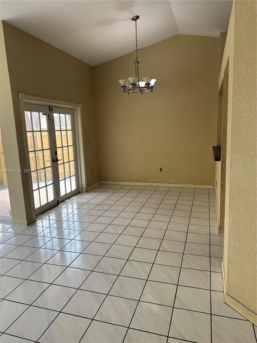 5861 Southwest 152nd Court Miami, FL 33193 - Photo 12 of 26 a view of empty room with windows