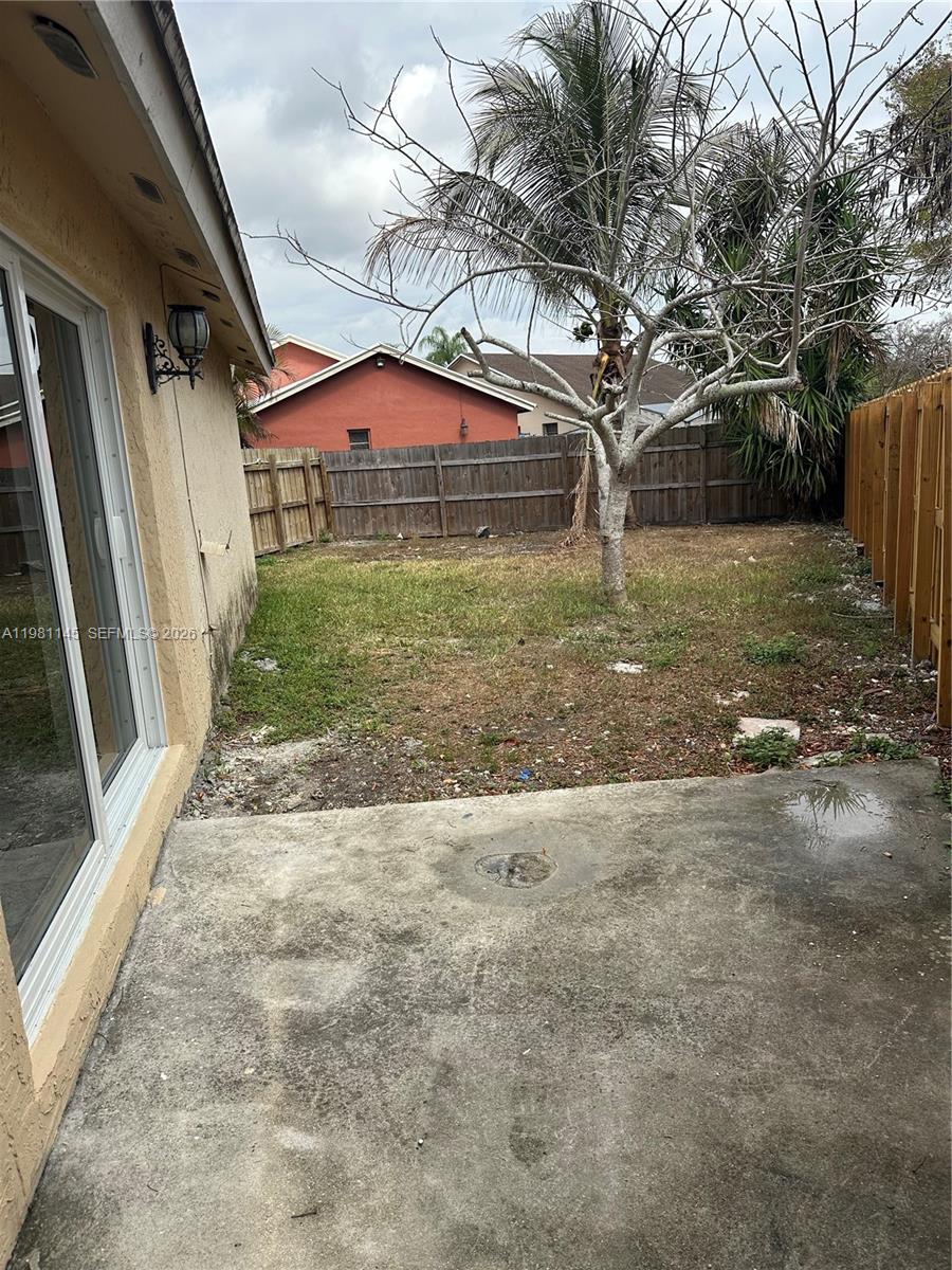 5861 Southwest 152nd Court Miami, FL 33193 - Photo 22 of 26 a view of a backyard
