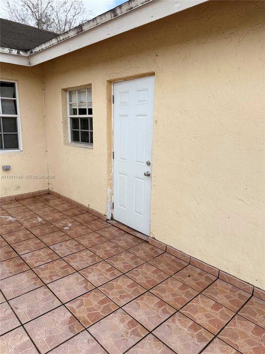 5861 Southwest 152nd Court Miami, FL 33193 - Photo 3 of 26 a view of a room with a window