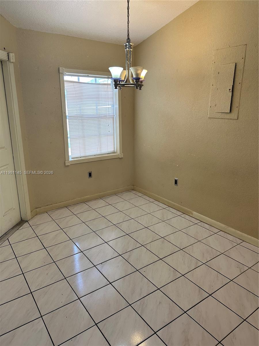 5861 Southwest 152nd Court Miami, FL 33193 - Photo 7 of 26 a view of a room with windows