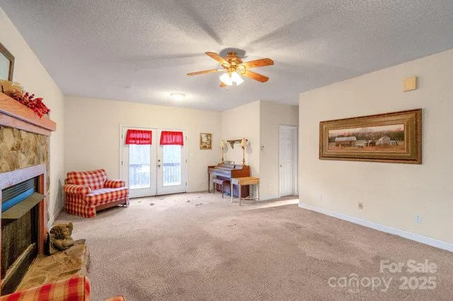 a kitchen with stainless steel appliances kitchen island granite countertop a stove and a sink