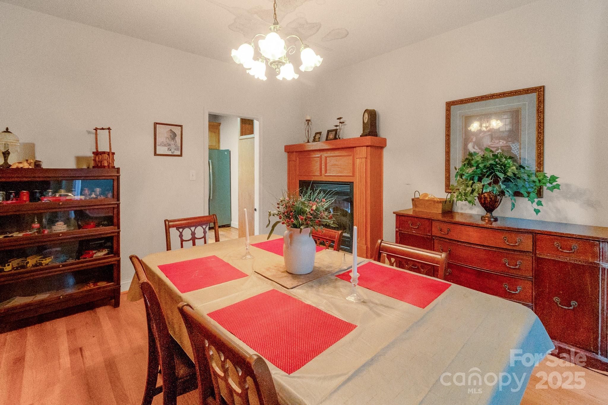 2775 State Rd S-29-285 Lancaster, SC 29720 - Photo 27 of 48 a view of a dining room with furniture and a potted plant