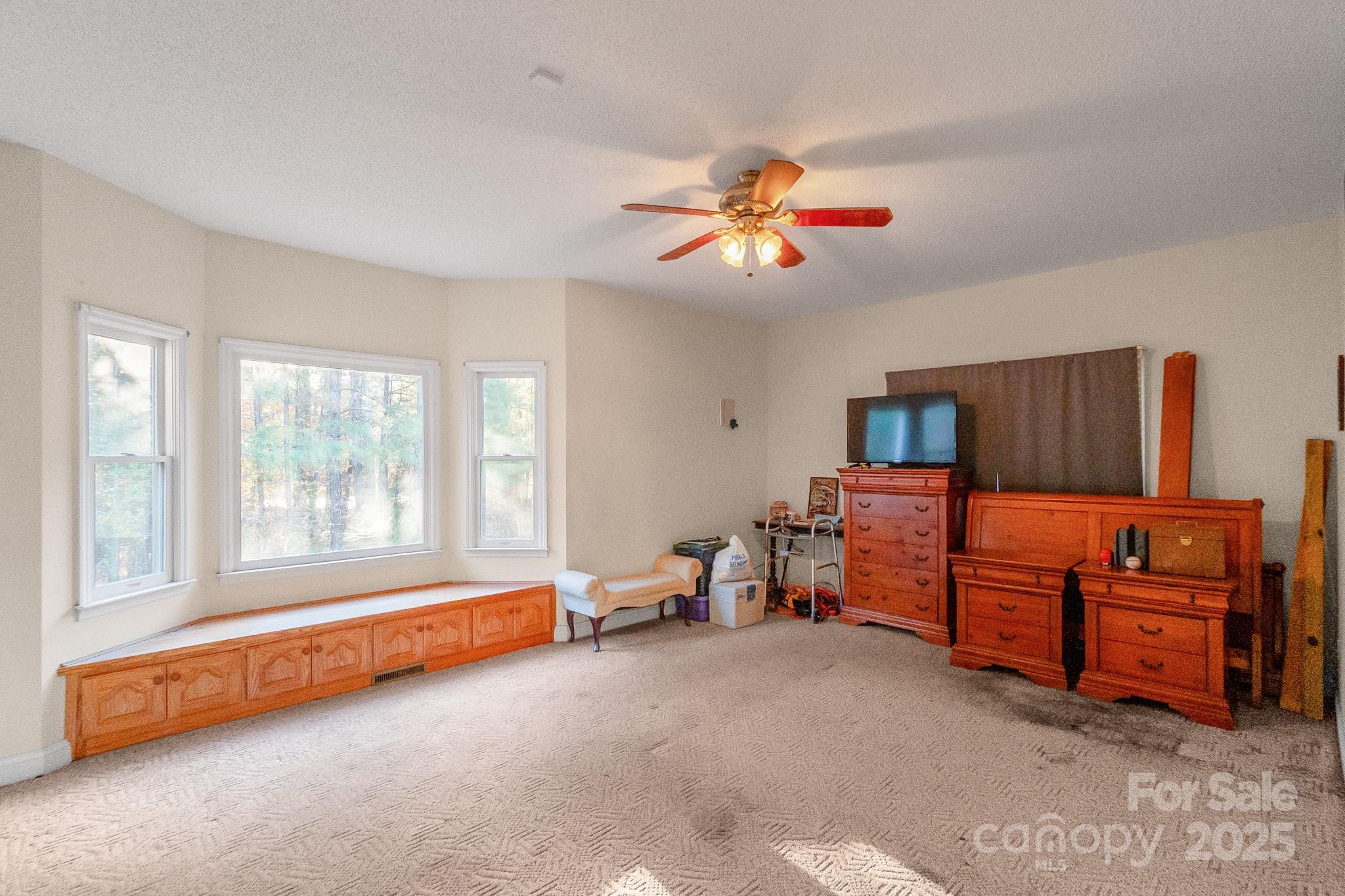 2775 State Rd S-29-285 Lancaster, SC 29720 - Photo 33 of 48 a living room with furniture and a flat screen tv