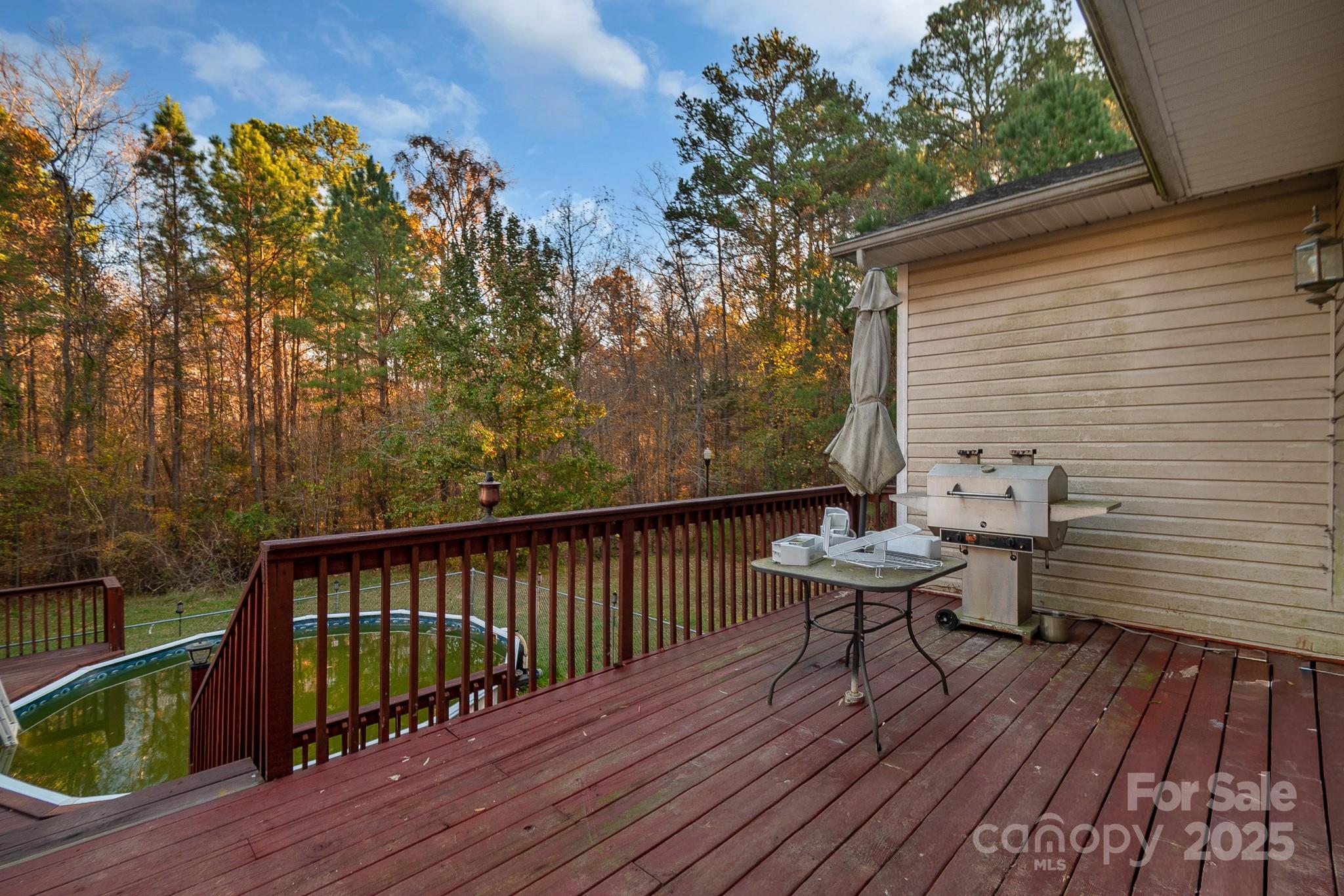 2775 State Rd S-29-285 Lancaster, SC 29720 - Photo 44 of 48 a view of a roof deck with wooden floor and seating space