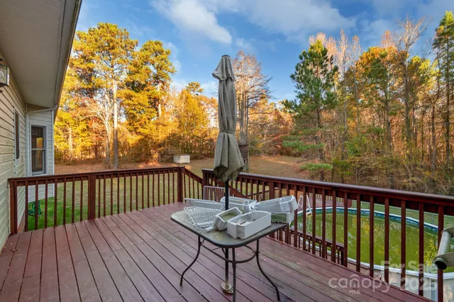an aerial view of house with yard